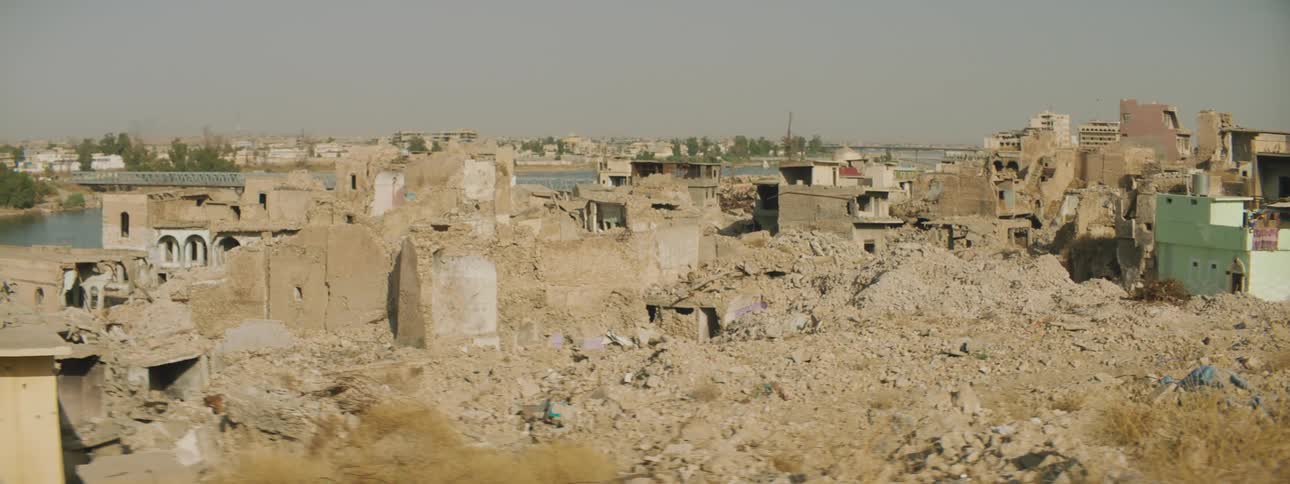 The ruins of a city under a cloudy daytime sky