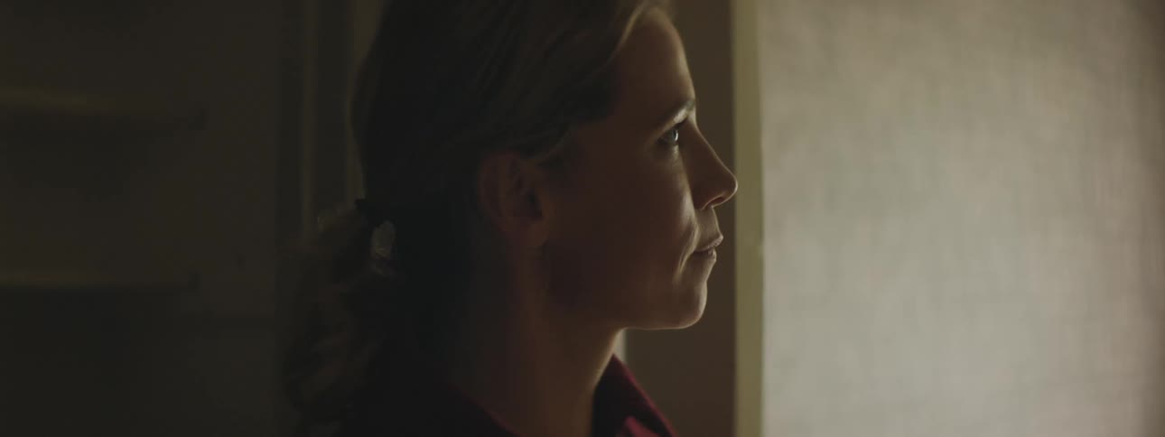 A woman is standing in a room