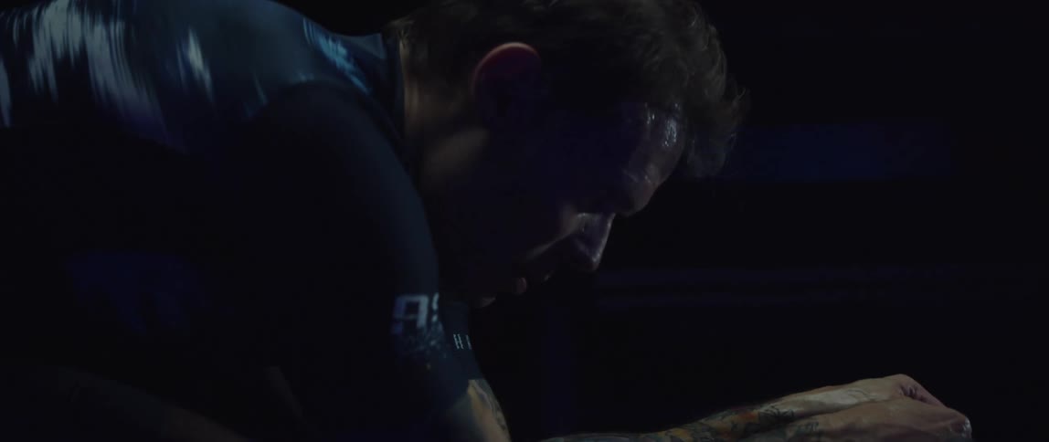 A man exercising on a bike