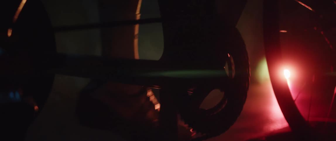 Close up of a persons feet as they ride a bike