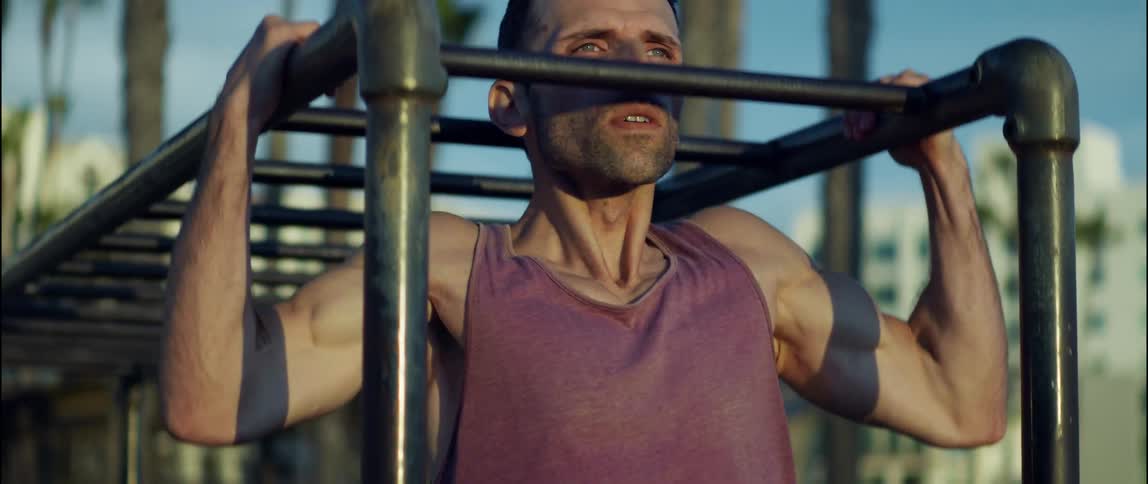 A man is doing pull ups