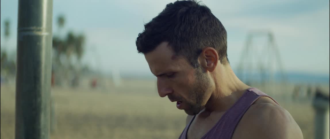 A man standing outside after working out