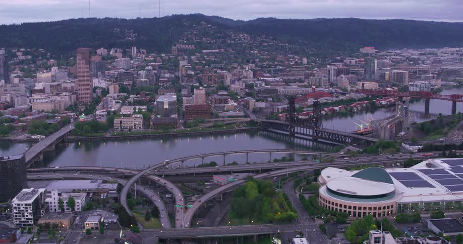 An aerial view of a city with a river