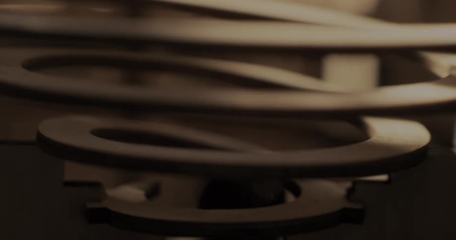 A ball is rolling down a round slope