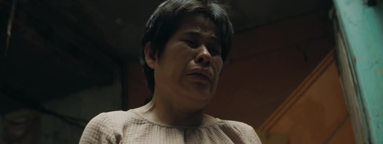 Mother crying indoors