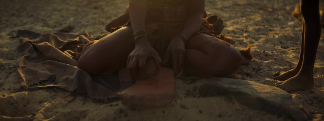 A villager is working on the ground