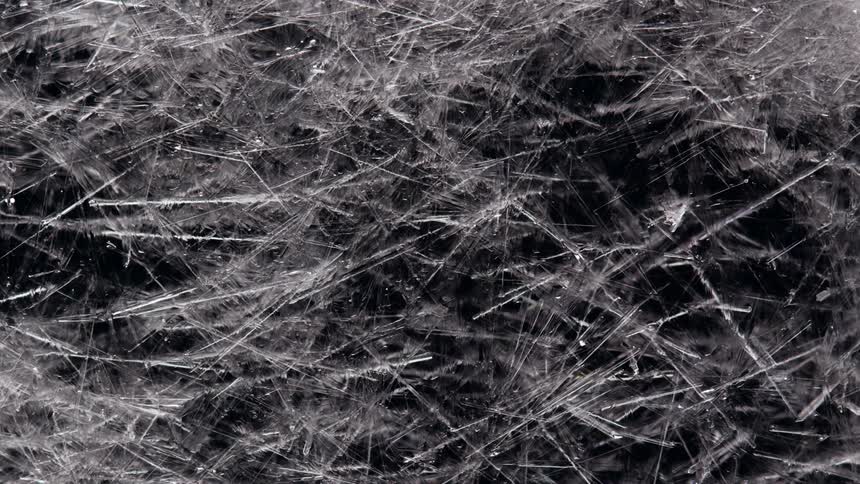 Time lapse of icicles forming outside at night