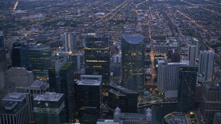 Tall buildings in the center of a metropolis in the evening