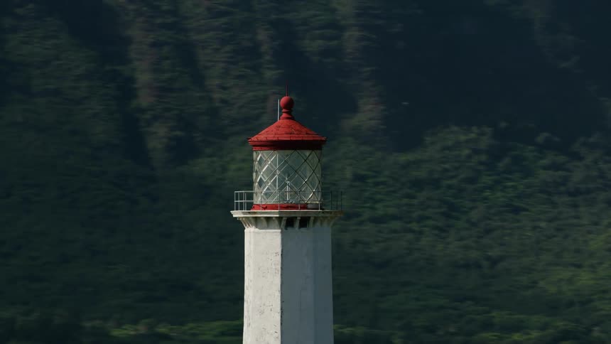 A lighthouse next to the ocean