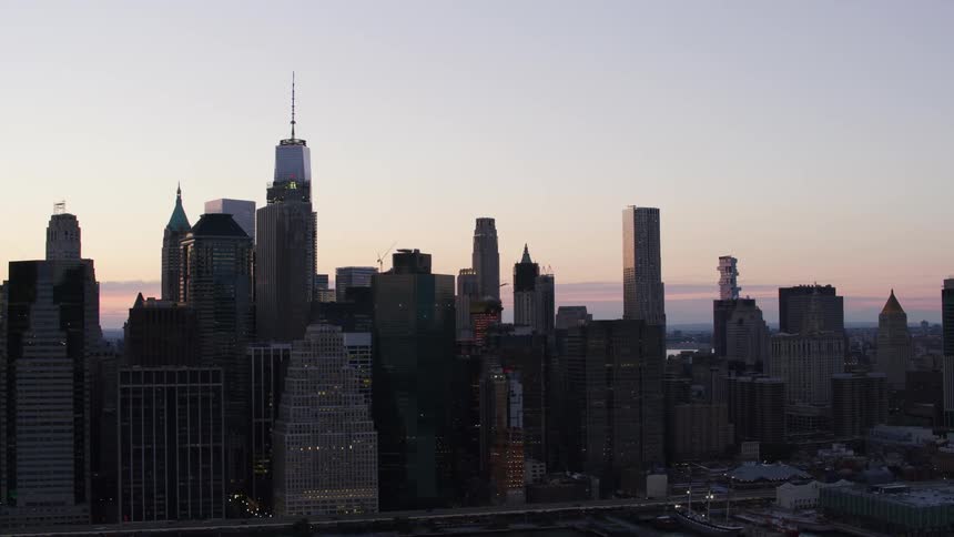 The sun sets over downtown