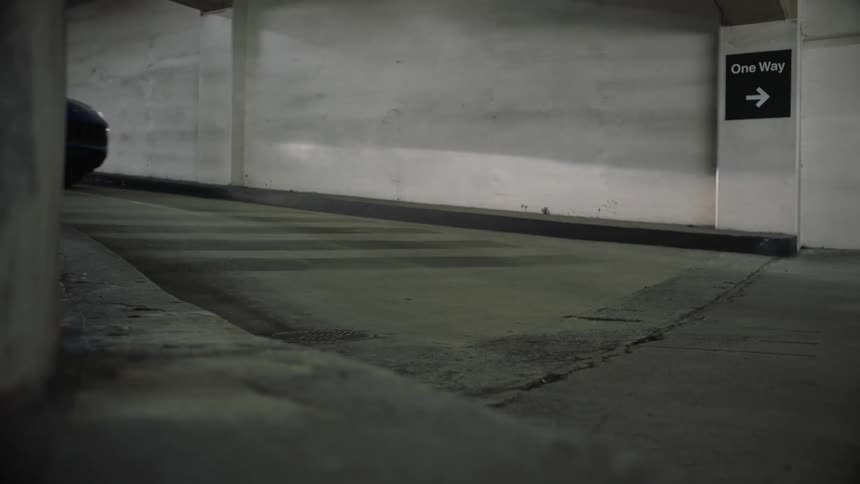 A car drives down the ramp