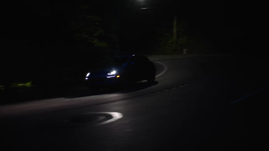 A car turns around the road