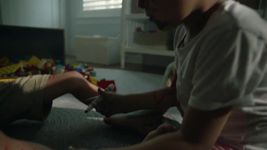 A father and son coloring