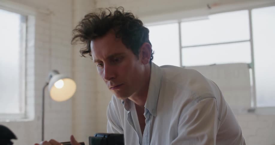 A person working with a video camera
