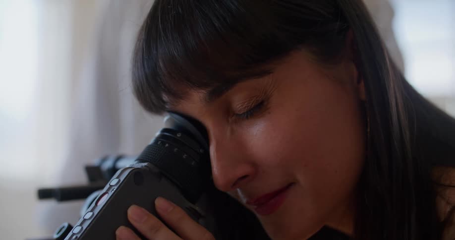 A woman using a video camera