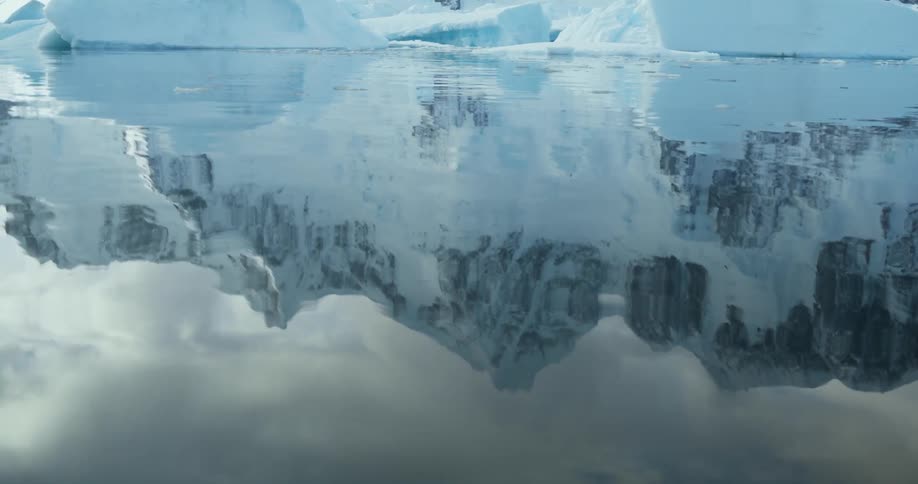 The mountains are reflecting on the water