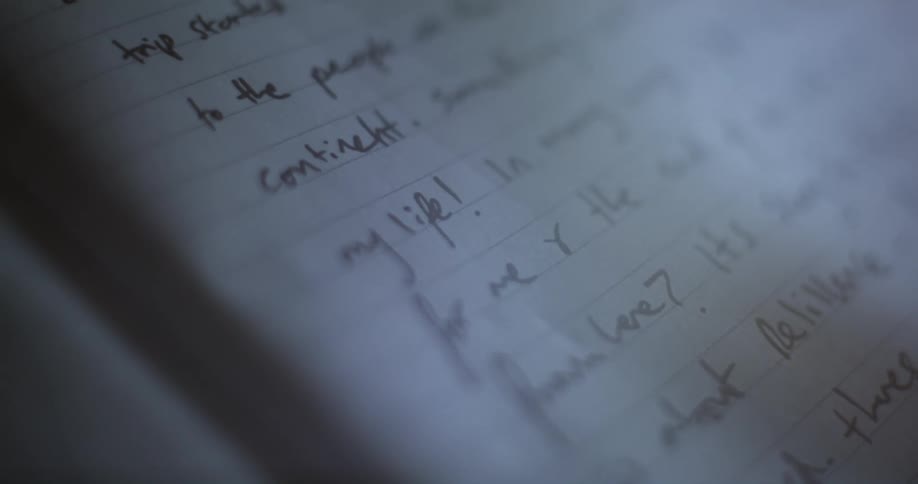 The page of the book is full of writing