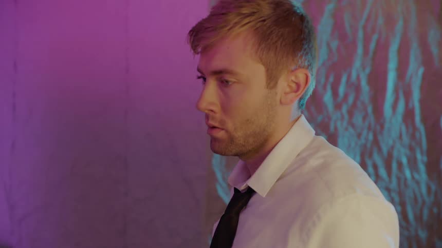 A man walking in a room