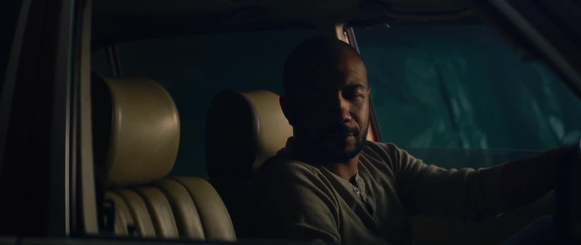 A man sitting in a car