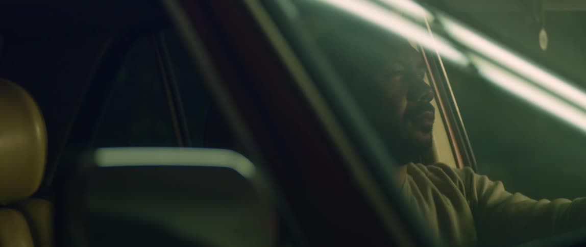 A man is sitting in the car