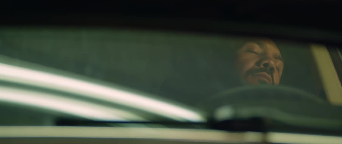 A man sitting in a car