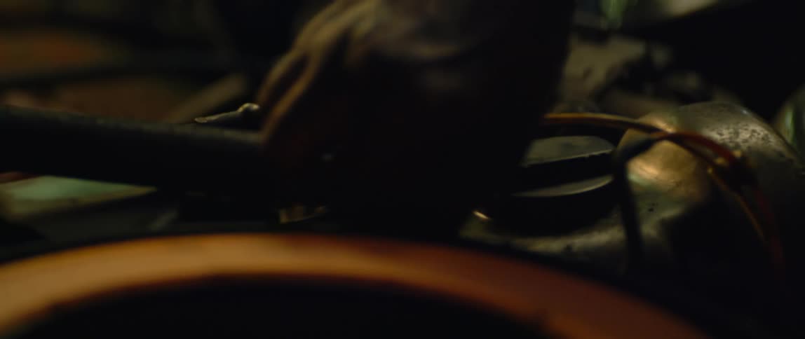 A mechanic working on a vehicle