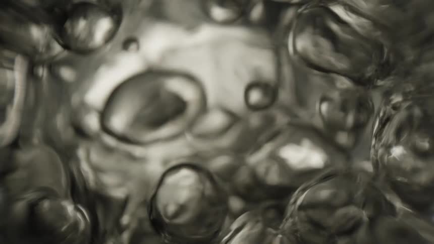 Close up of air bubbles flowing to the surface of the water