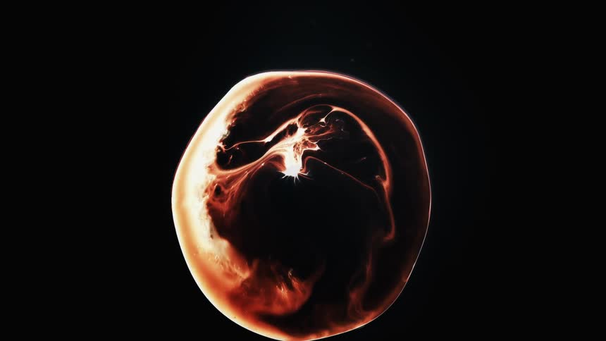 A fiery substance expands outward in a circle