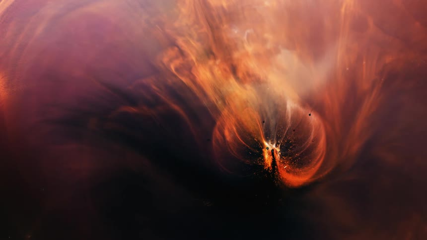 Purple and orange colors swirl together to create an abstract pattern