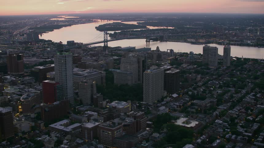 An aerial view of buildings and skyscrapers in a large city