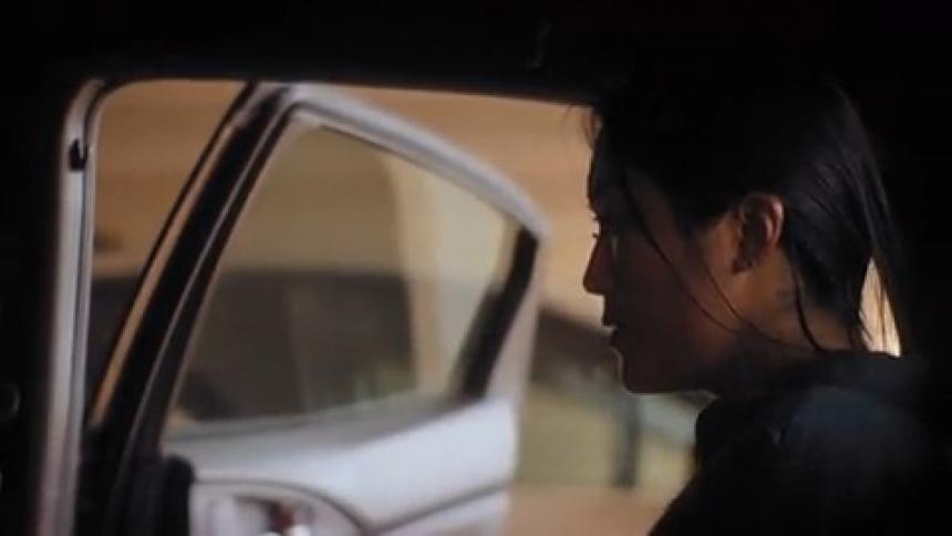 A troubled woman gets in the car