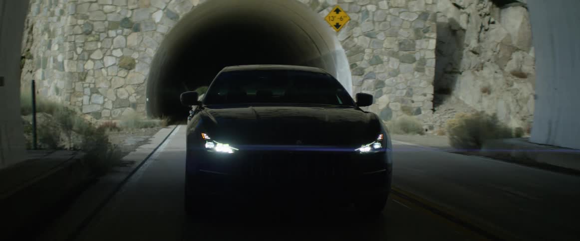 A car drives through the tunnel