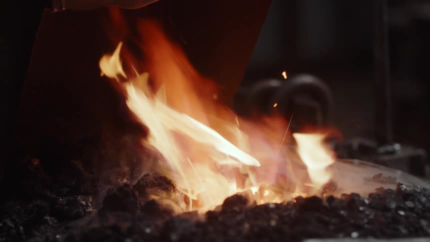 A fire burning in a forge