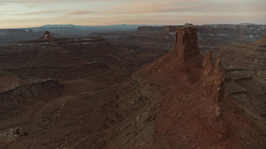 A dusting of snow covers part of a canyon