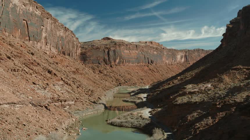 A stream runs through the canyon
