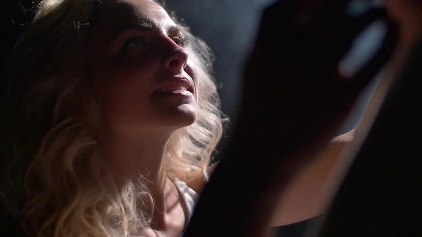A woman smiling up at a man