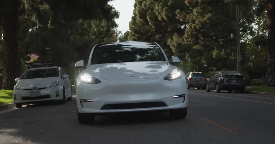 A car driving down a road in slow motion