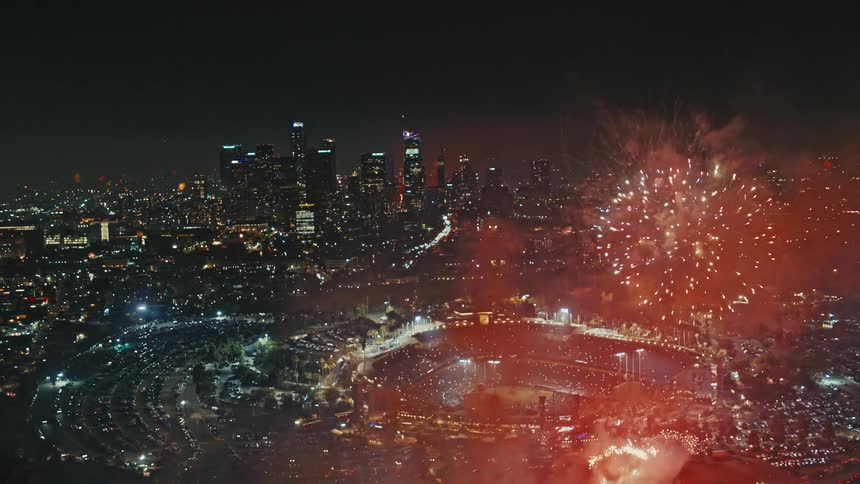 An aerial view of downtown Los Angeles and Dodger Stadium celebrating the 4th of July with fireworks