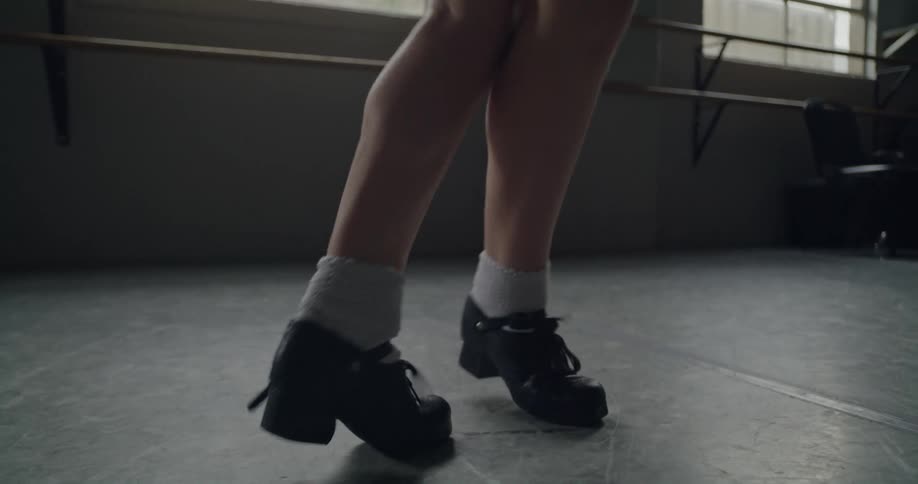 A person dancing in a studio