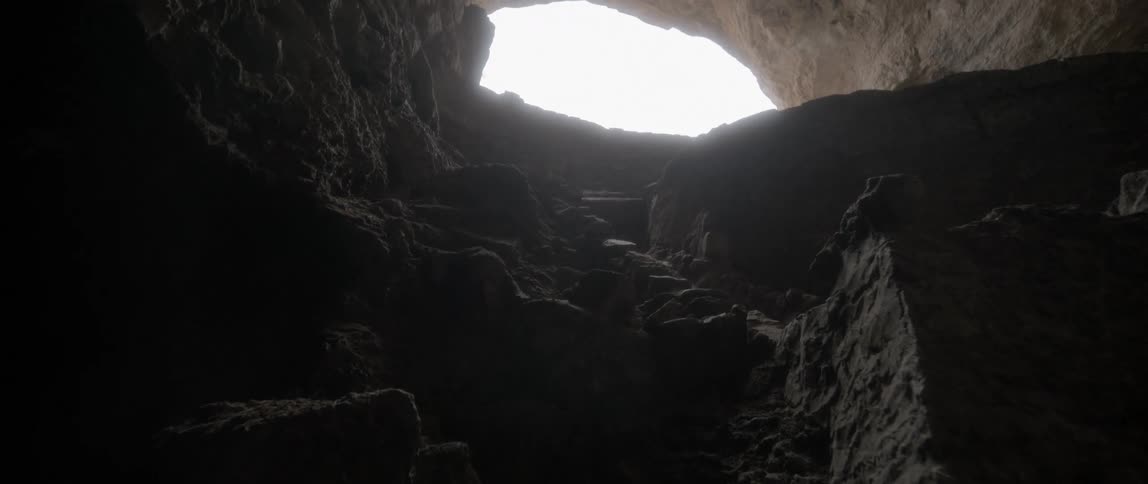 A view of a cave in a canyon