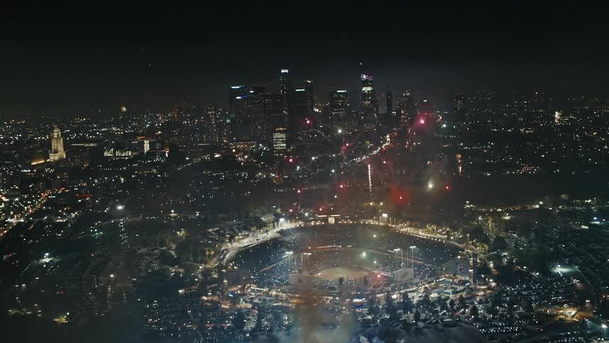 Fireworks are exploding over a stadium in downtown Los Angeles