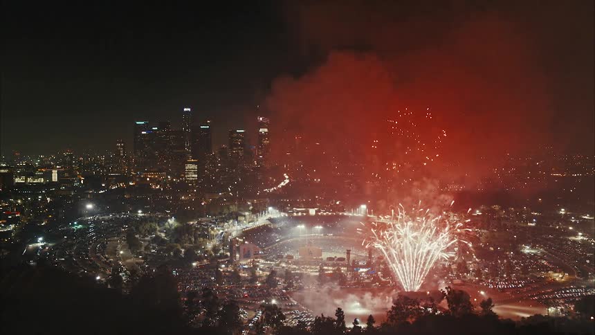 A fireworks display outside of Dodger Stadium at night