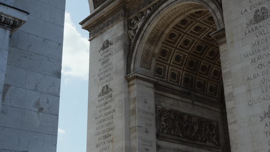 An arch monument with stone artwork in france