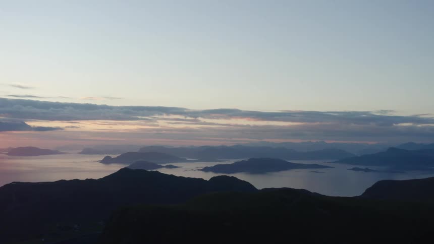 The view is of a water stream and mountains