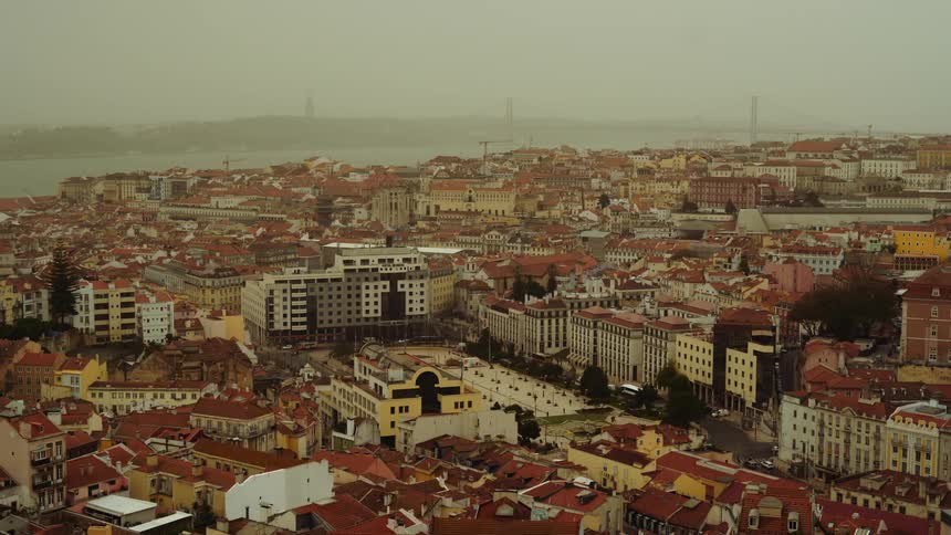 Aerial view of a developing city is displayed at dusk