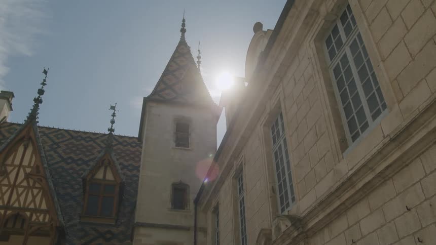 Close up view of a building during midday is displayed