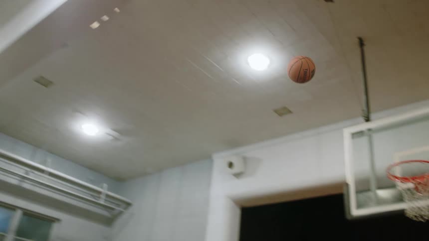 Youths play basketball in the gym
