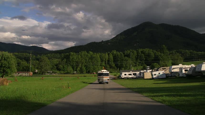 An rv drives down the road