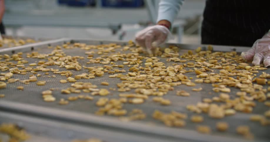 A person moving around food