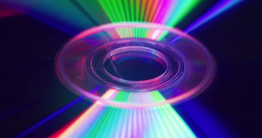 A rainbow of color on the smooth surface of a compact disc